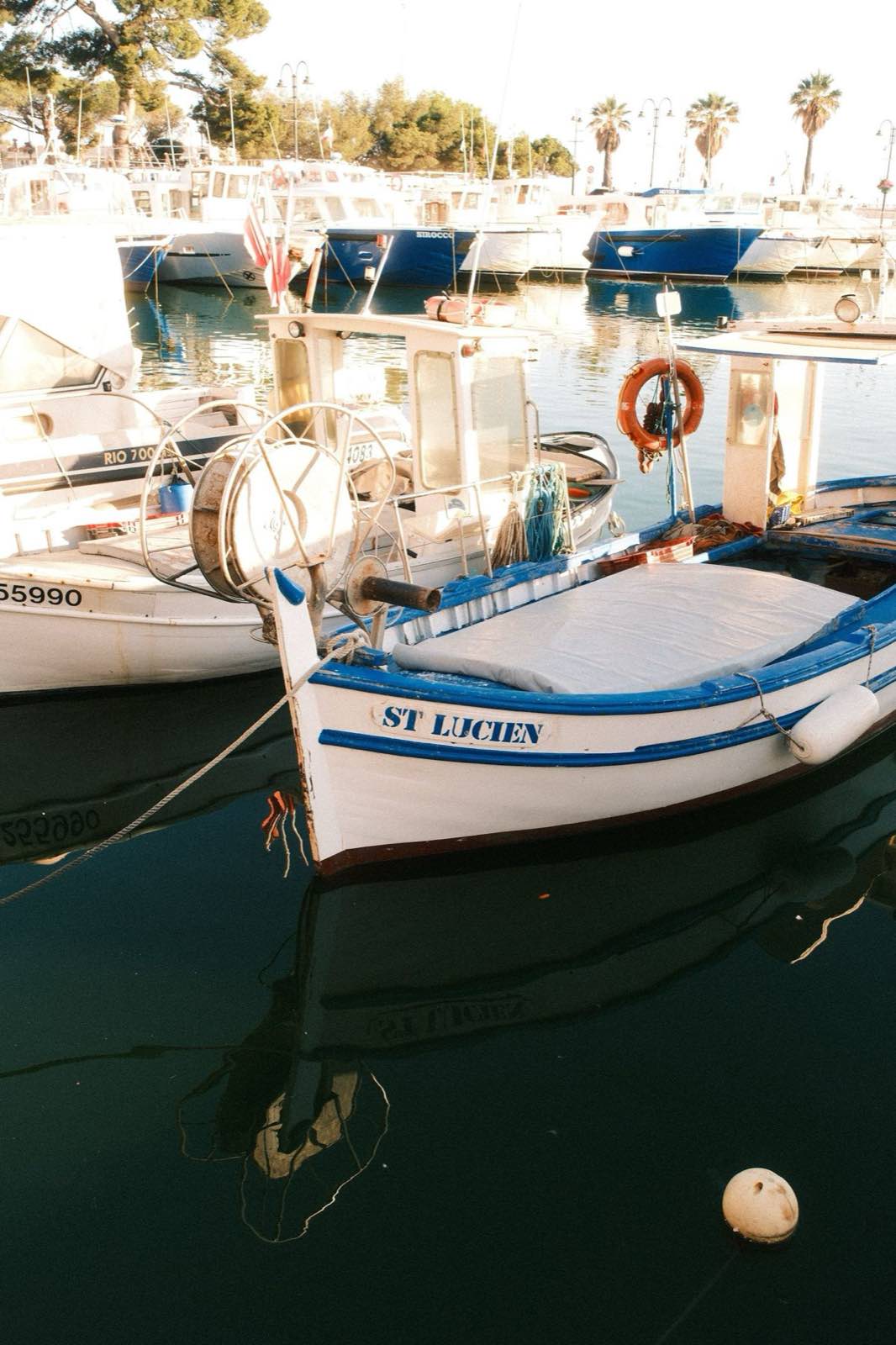 Fishing boats lying in a Mediterranean harbour at evening